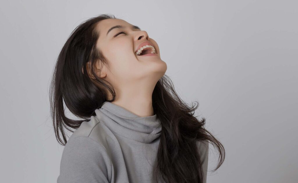Woman looking up and smiling